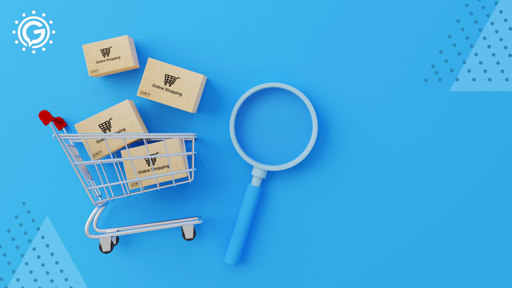 A miniature shopping cart next who a miniature magnifying glass on a teal surface.