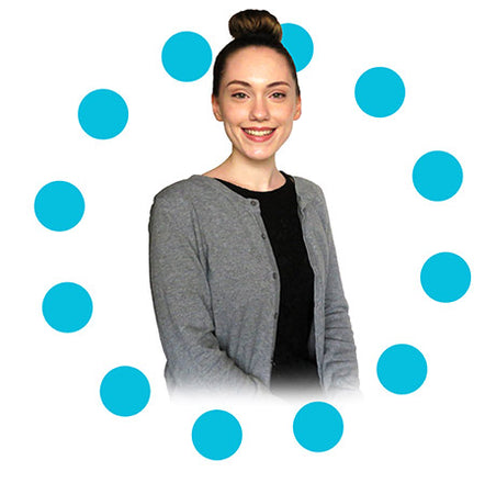 Female caucasian  Mckenna VP of content head shot in a blue circle of dots. Mckenna has her brunette hair in a bun and wearing a black shirt with a grey cardigan. 